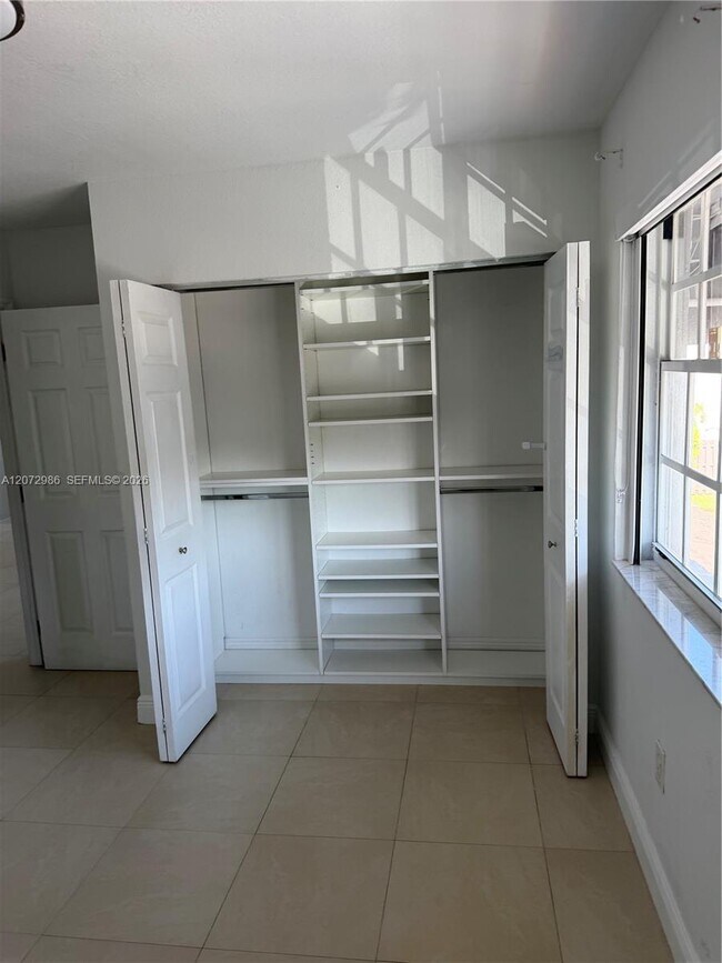 Building Photo - 7040 NW 173rd Dr