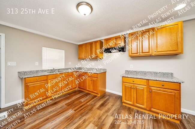 Building Photo - 313 25th Ave E