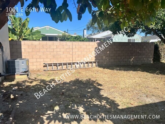 Building Photo - 1001 E 66th Way