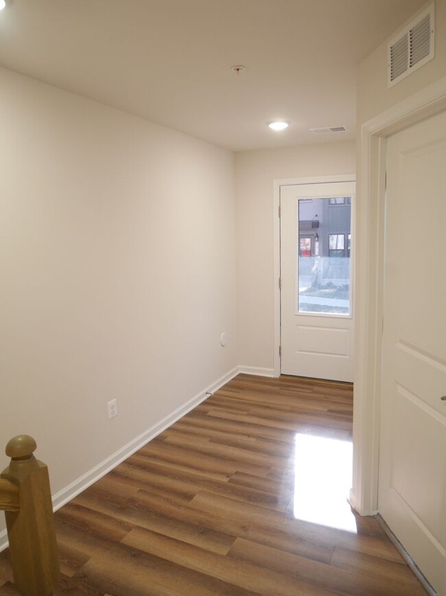 Building Photo - NEW BUILD! Four Bedroom Townhome- Prime Lo...