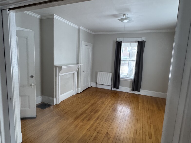 Front parlor with closet and entrance to foyer - 34 Elm St