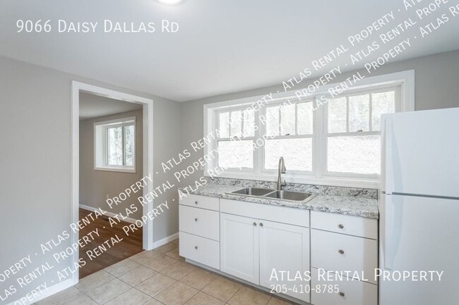 Building Photo - 9066 Daisy Dallas Rd