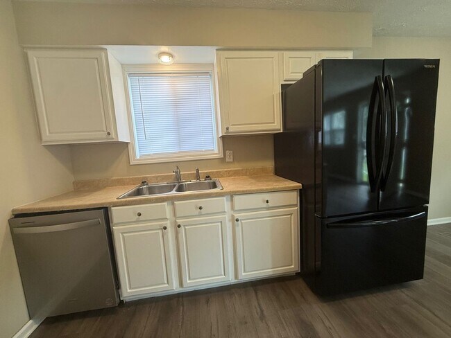 Building Photo - Newly rehab, three bedroom, one bath and Christian Park with a fence yard.