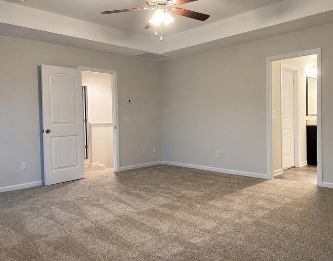 Building Photo - 4BR Home with Community Pool & Modern Finishes!