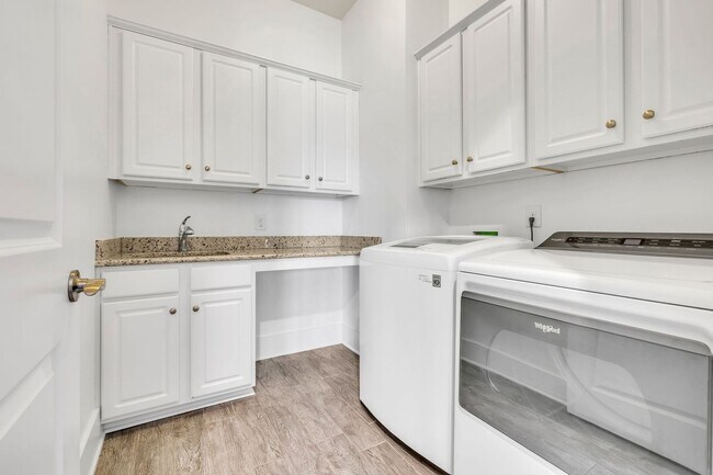 Building Photo - Beautifully maintained and move-in ready, this stunning mostly one-level all-brick home