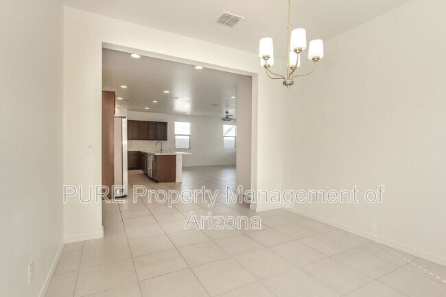 Building Photo - 3769 N 102nd Ave