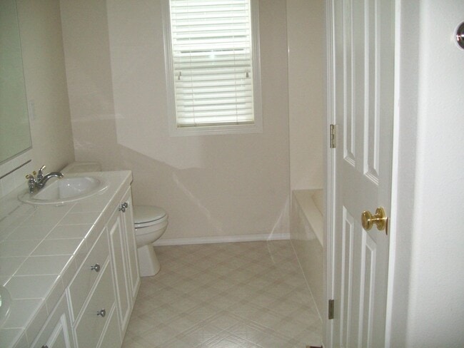 Building Photo - 12556 NW Brimpton Ct
