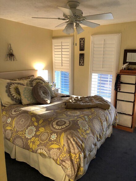 Fits a Queen bed with side tables easily - 1552 Boyle St