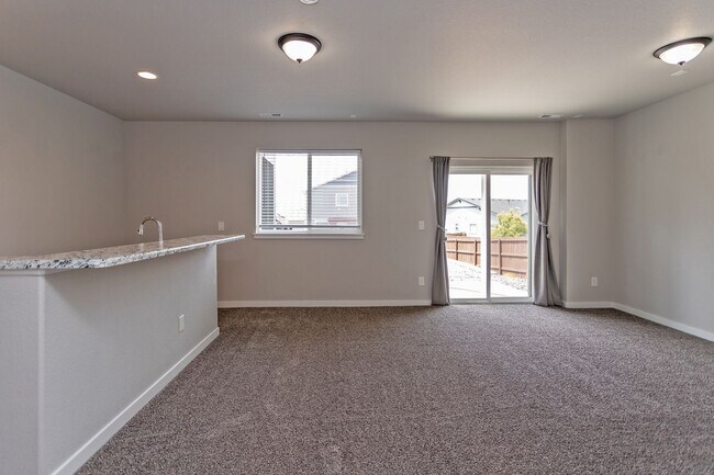 Building Photo - Spacious 5-Bedroom Home with Finished Base...