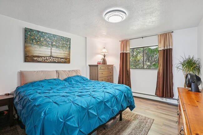 Building Photo - Springville Condo with Updated Kitchen, Deck & Creekside Setting