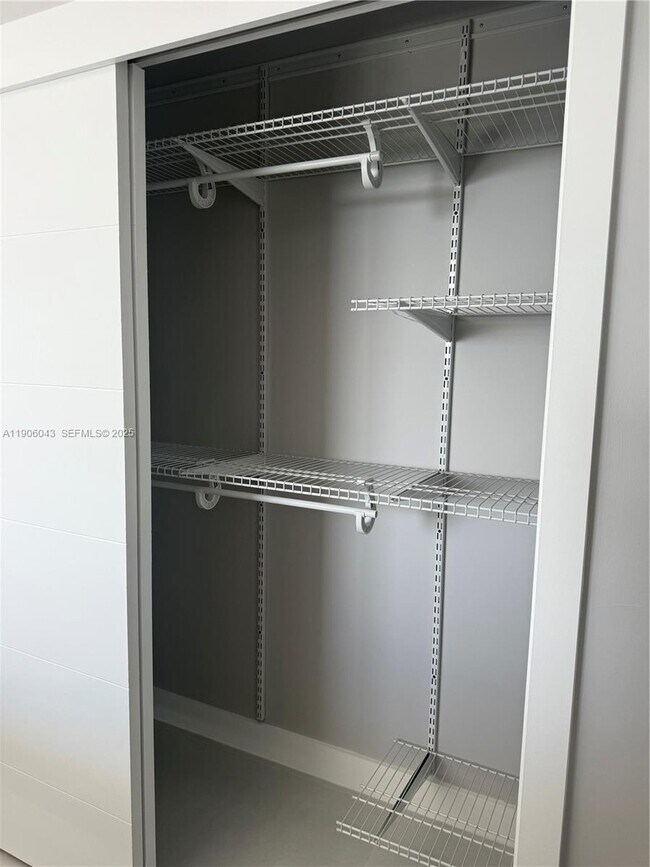 Building Photo - 3675 N Country Club Dr