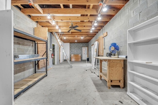 Building Photo - Charming home with large garage & attached...