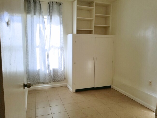Building Photo - Triplex Unit Coming Soon