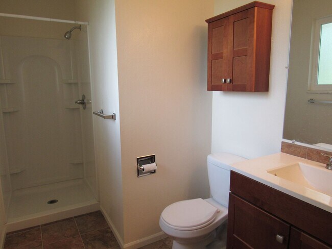 Building Photo - Spacious Bi Level home backing to open space