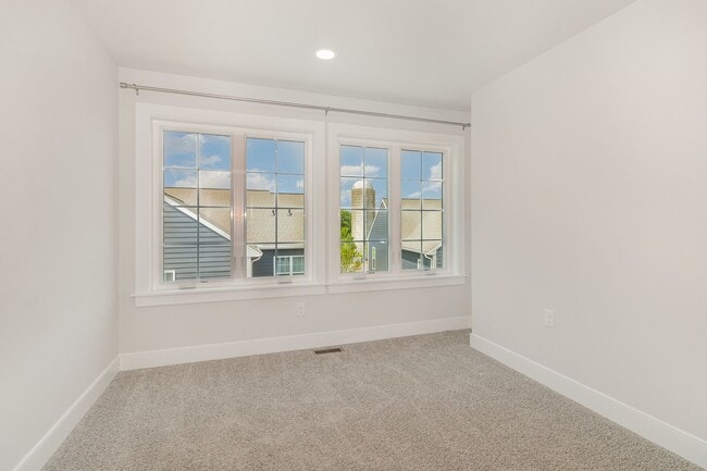 Building Photo - Modern 2025 Townhome | Open-Concept Living, Chef’s Kitchen with Large Island & 2-Car Garage