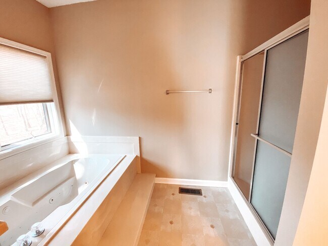 Building Photo - Introducing a stunning 3 bedroom, 2 bathroom home nestled in the serene surroundings of the East ...