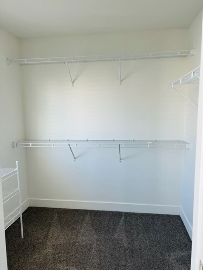 Building Photo - Beautiful 2018 townhome with 2 car garage and tall ceilings.