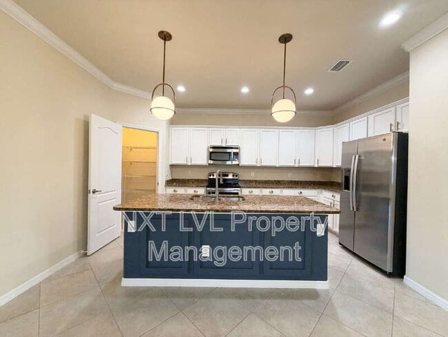 Building Photo - 9453 River Otter Dr