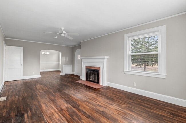 Building Photo - SW, Large Brick Two Bedroom PLUS Two Sun-Rooms, Hardwoods, LR & Separate DR, Fire Place!