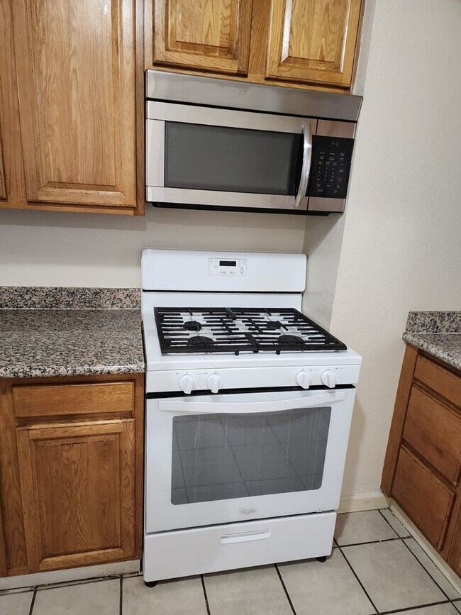 Building Photo - 3 bedroom 1 bath with Garage converted to ...