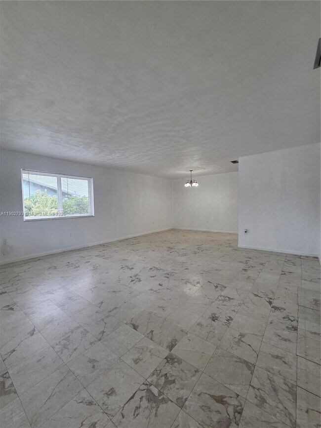 Building Photo - 10725 NW 8th Ave