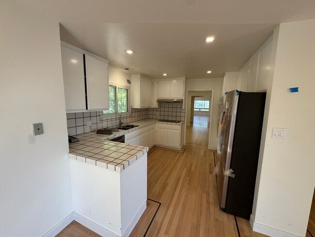 Building Photo - Open House Sunday 4/19 11 am - 12 pm:  Beautifully Updated Corner-Lot Home in Millbrae – Spacious...