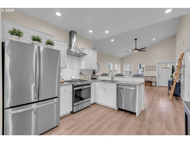 Building Photo - Bright Open-Concept Home with Vaulted Ceilings, Private Primary Suite & Stylish Modern Finishes