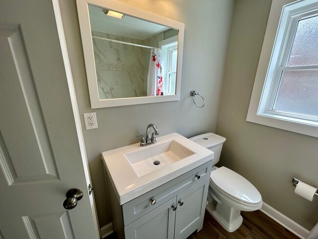 Building Photo - DELHI TWP- Spacious 4 bedroom 3 bath Cape Cod with garage