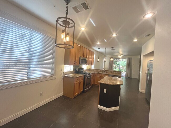 Building Photo - Discover this Gem w/sparkling pool & spa!