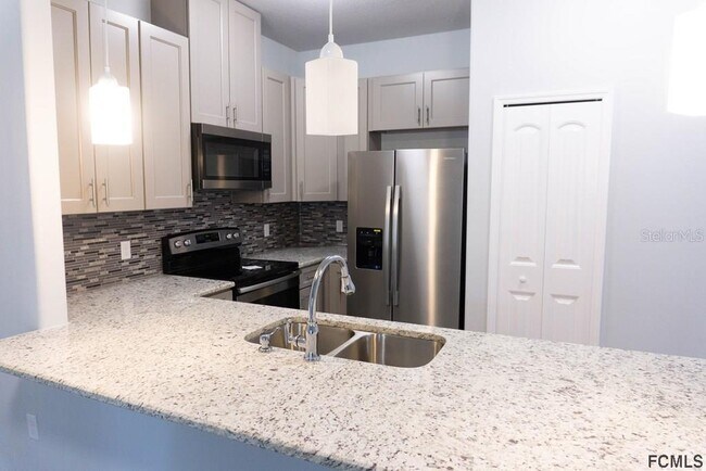 Building Photo - 214 Coral Reef Ct N