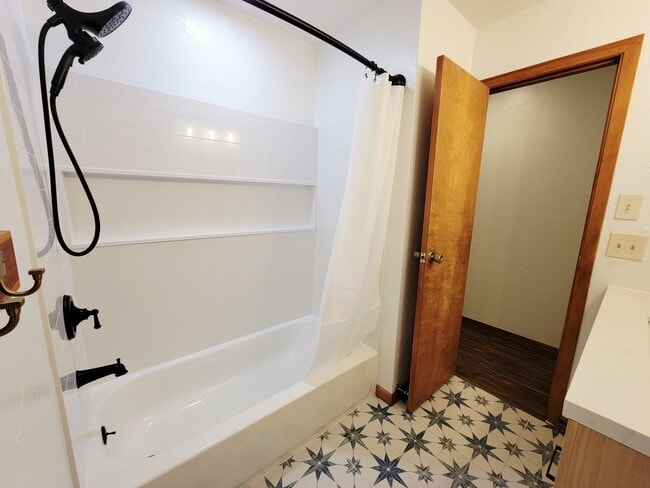 Building Photo - Pet-Friendly Rental with Fenced Yard & Bon...