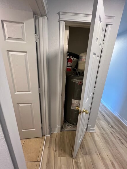 Hot water heater closet in front of second floor secondary bathroom - 224 W Loucks St