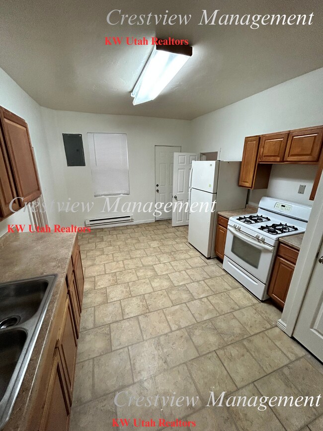 Building Photo - Cozy 2-Bedroom Home in Convenient Salt Lake City Location