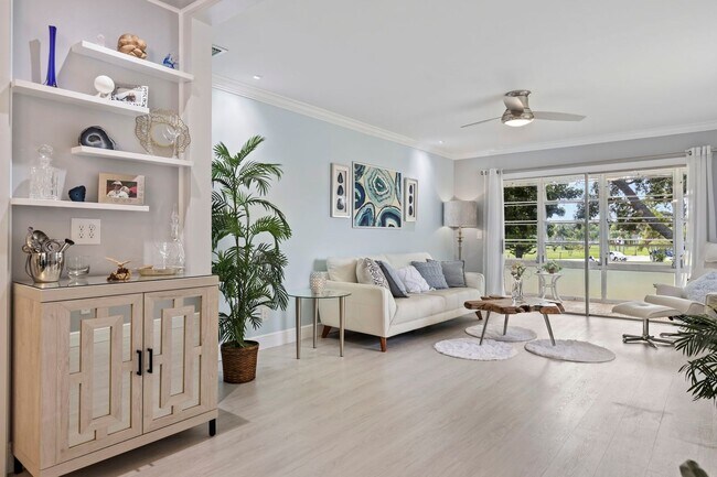 Building Photo - (55+) 2/2 Fully Renovated Furnished Condo ...