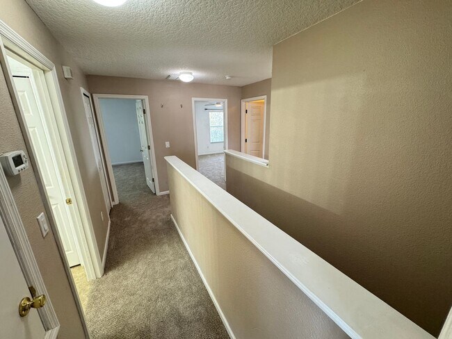 Building Photo - 5 Bedroom Townhome in Avalon Park! TESLA CHARGER INCLUDED!