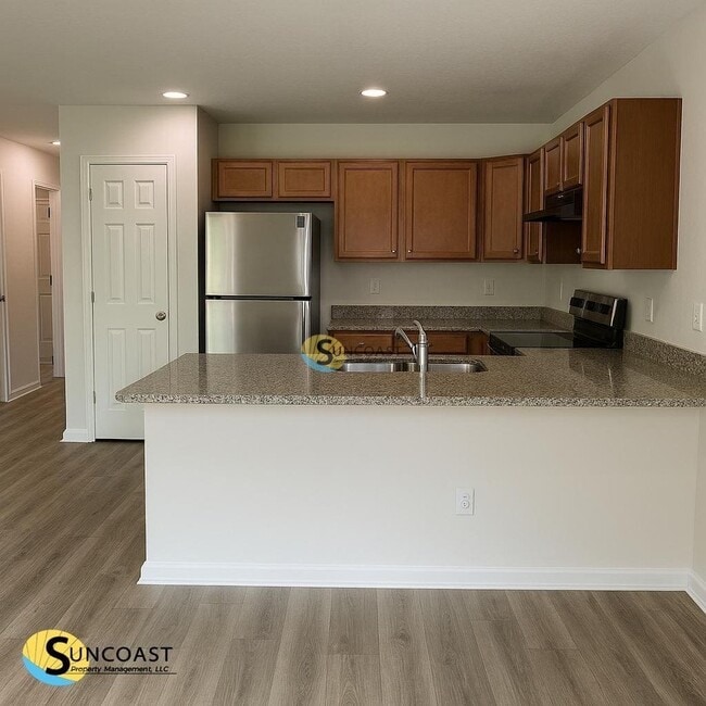 Building Photo - 7622 Rain Forest Dr N