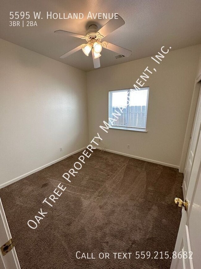 Building Photo - 5595 W Holland Ave