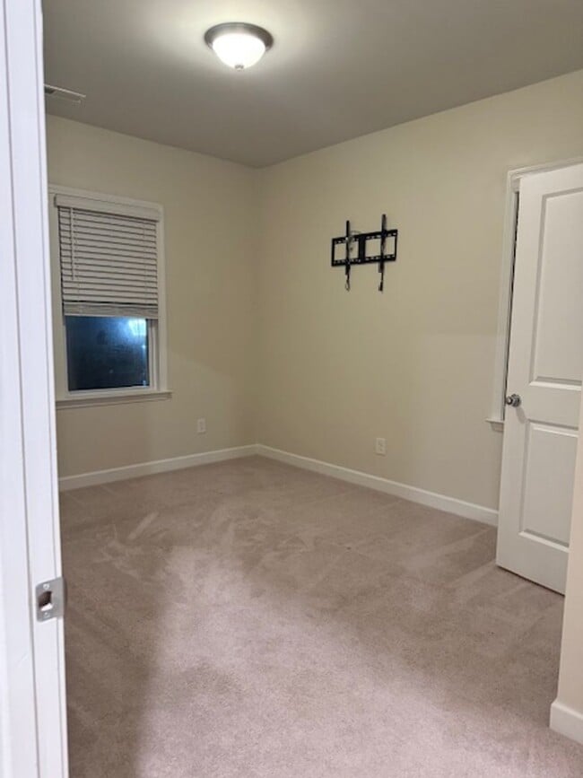 Building Photo - *END UNIT ROLESVILLE TOWNHOME*