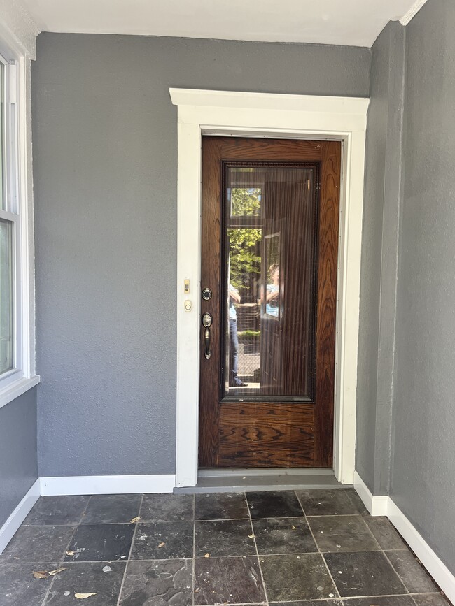 Front entry door, original to the house. This door leads into building from the front porch. - 3517 19th Ave S