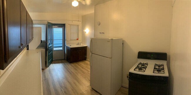 Building Photo - ***NO PET DOGS*** 2 Bedroom - All Utilities Included