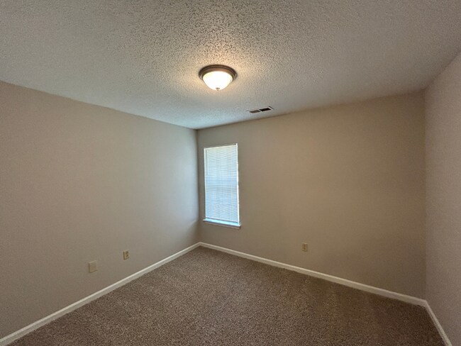 Building Photo - Spacious 3BR/2BA Lake Community Home | Soaring High Ceilings, Fireplace & 2-Car Garage
