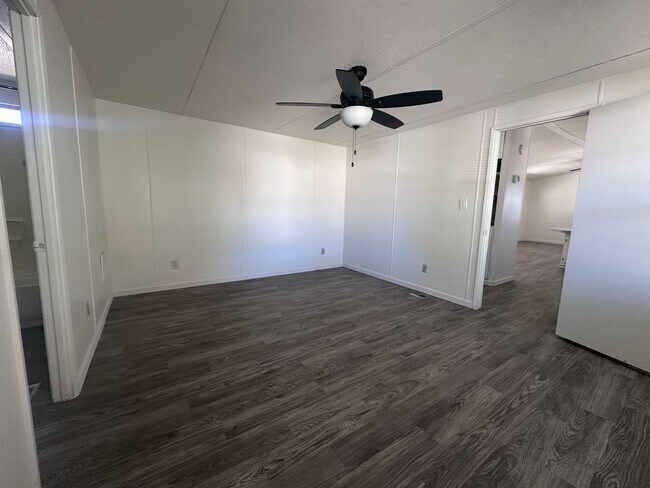 Building Photo - 2br 1Ba Manufactured Home with large Patio Front/Rear yard plus garden area