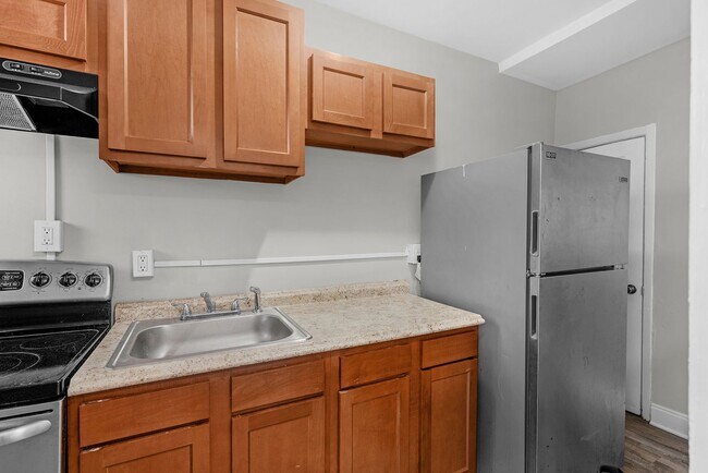 Building Photo - Charming Updated Rowhome in Belair-Edison – Move-In Ready!
