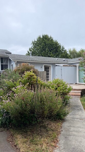 Backyard deck and outside bathroom - 201 6th Ave