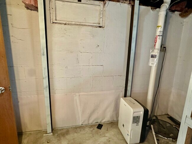 Sump pump and radon solution built in basement. - 1444 Dodge St