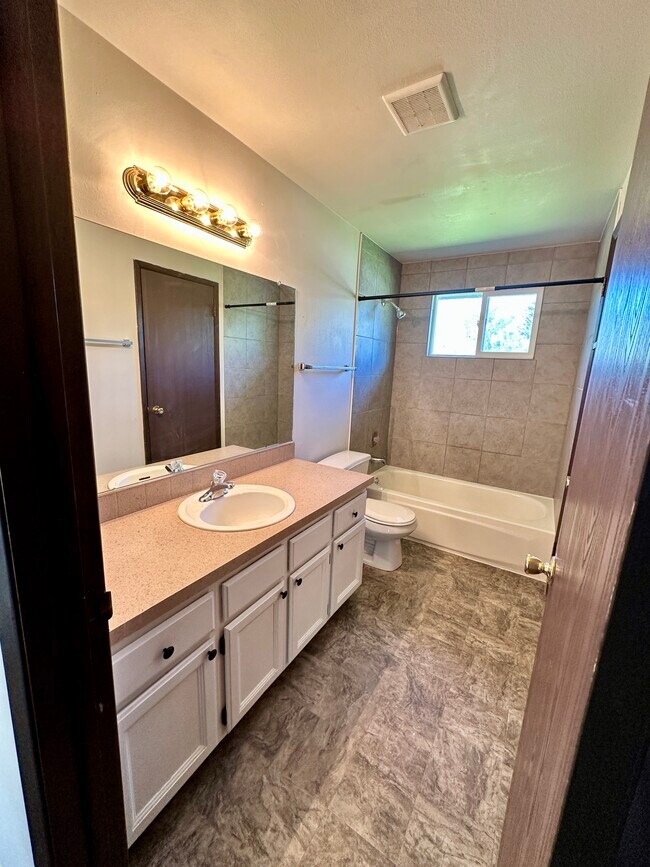 Upstairs bathroom - 13409 E 8th Ave