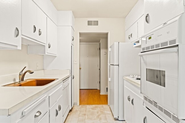 Building Photo - Utilities & Parking Included! Massive 2BD w/ Community Amenities