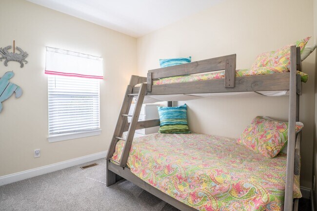 Building Photo - PRICE REDUCTION! LIVE AT THE BEACH FOR THE WINTER - AVAILABLE MID-MARCH