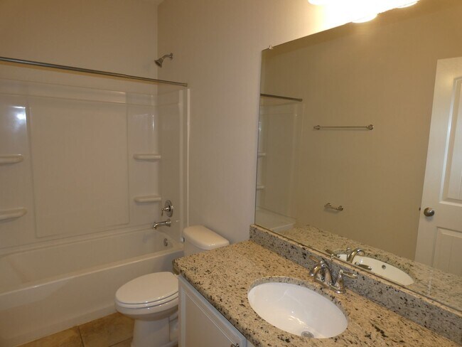 Building Photo - Spacious 5-Bedroom Home - Heart of Pace