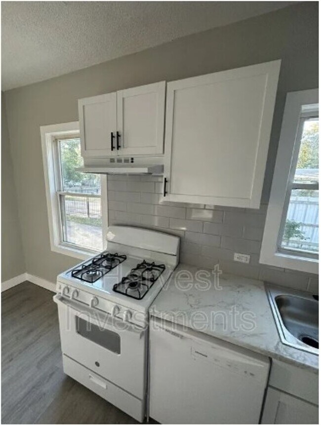 Building Photo - Welcome to Your Next Home with Harvest Investments!